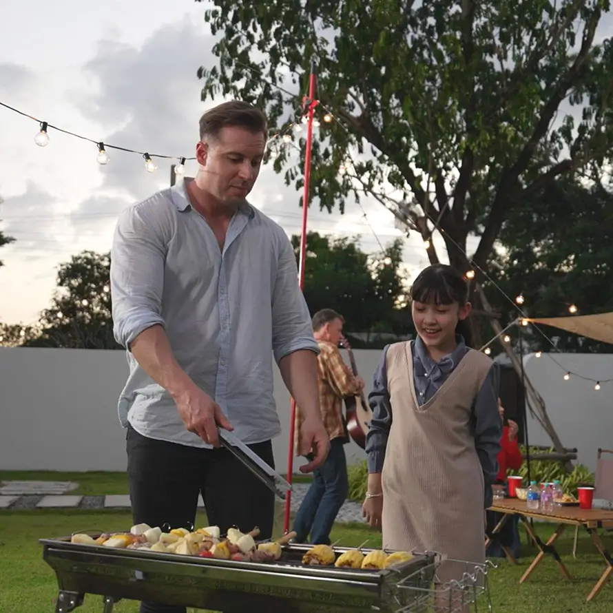 family enjoying the barbecue vibes