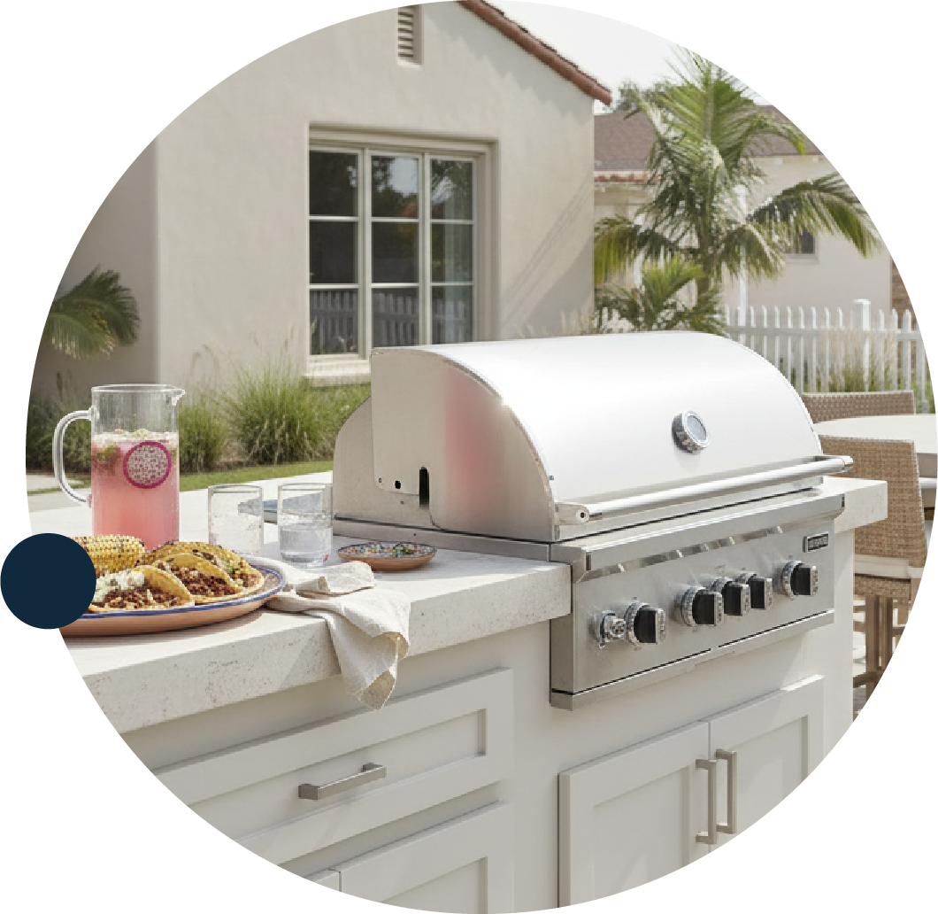 customer BBQ island product showcase featuring a custom built island with a Coyote grill